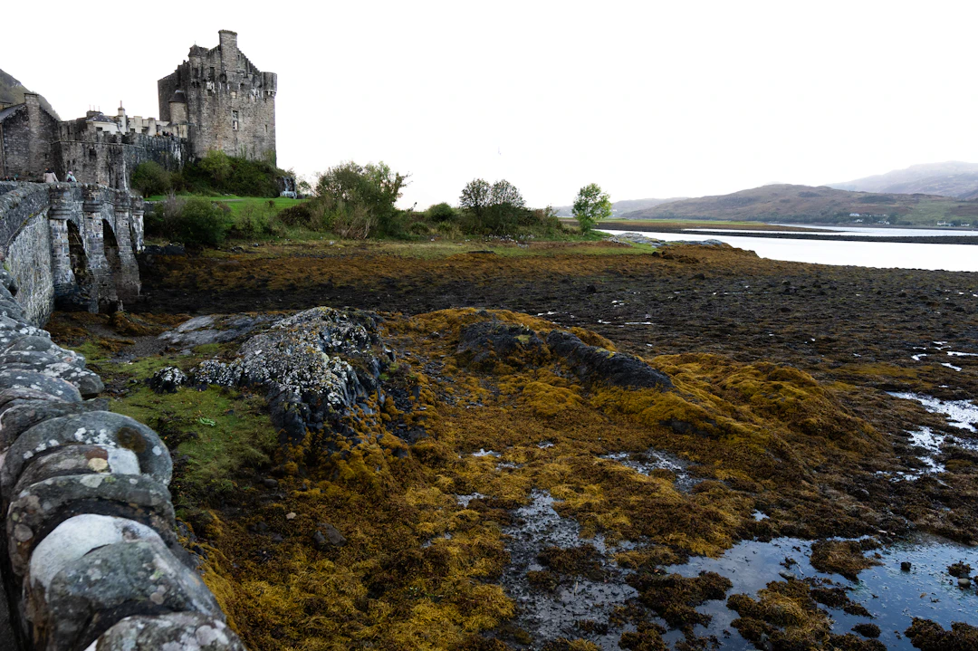 Eilean Donan Castle beside the shore in Scotland, a British Isles cruise stop