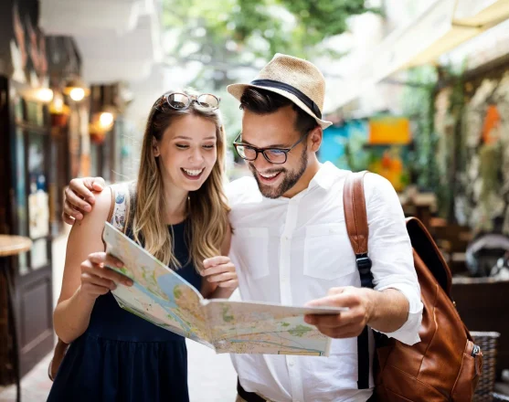 tourist-couple-traveling-travel-walking-on-street-portrait-of-beautiful-young-people-1